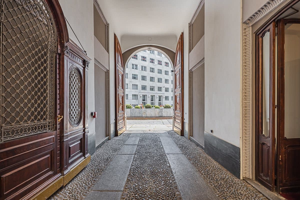 The monumental entrance hall of an early-1900s palazzo