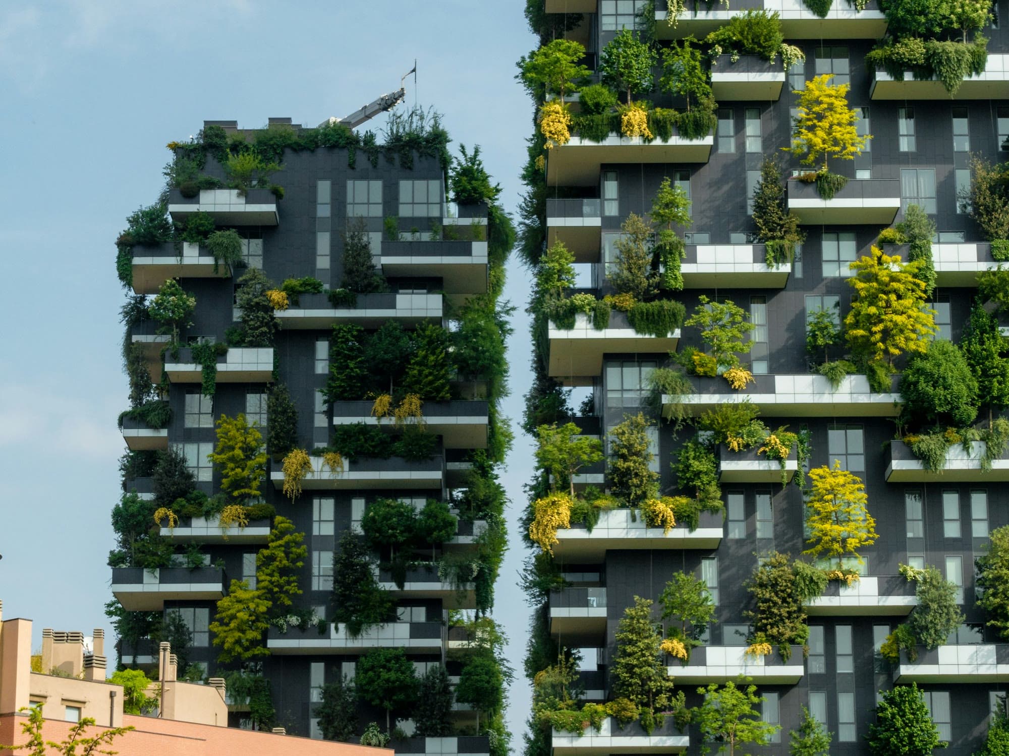 The two towers of the Bosco Verticale, covered in trees