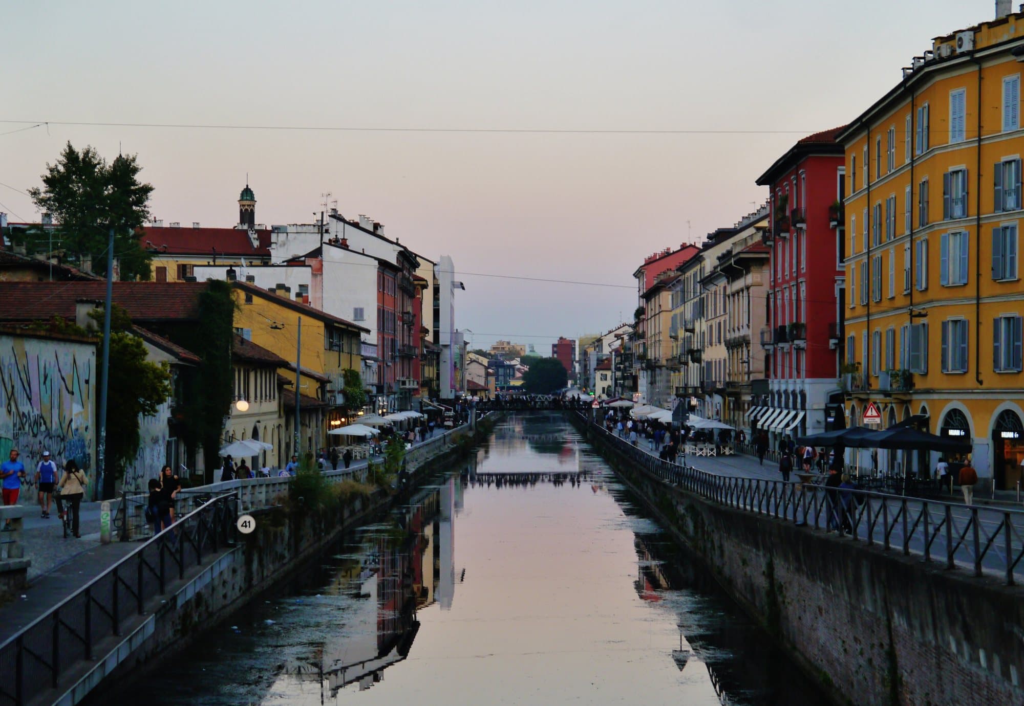 The Naviglio Grande at dusk, between its old tenement houses